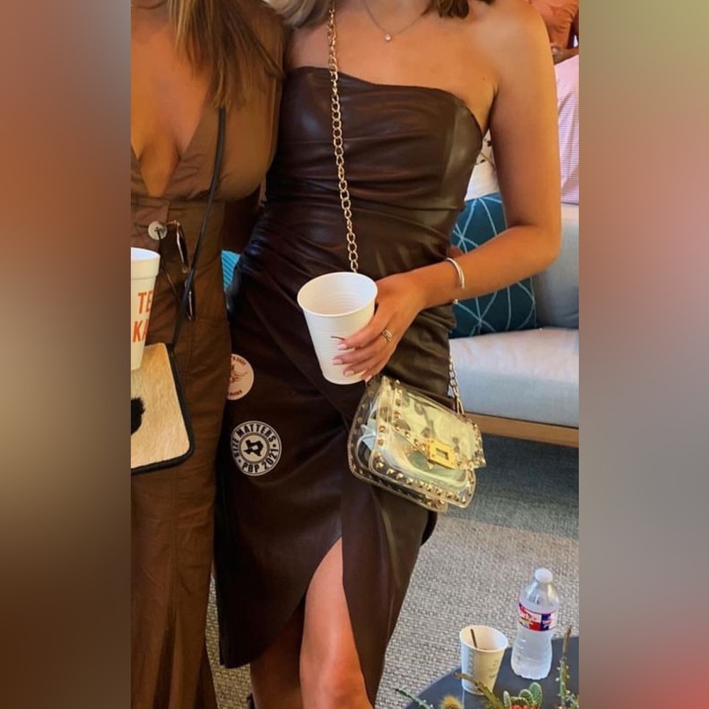 Brown leather midi dress. Cute for game day
